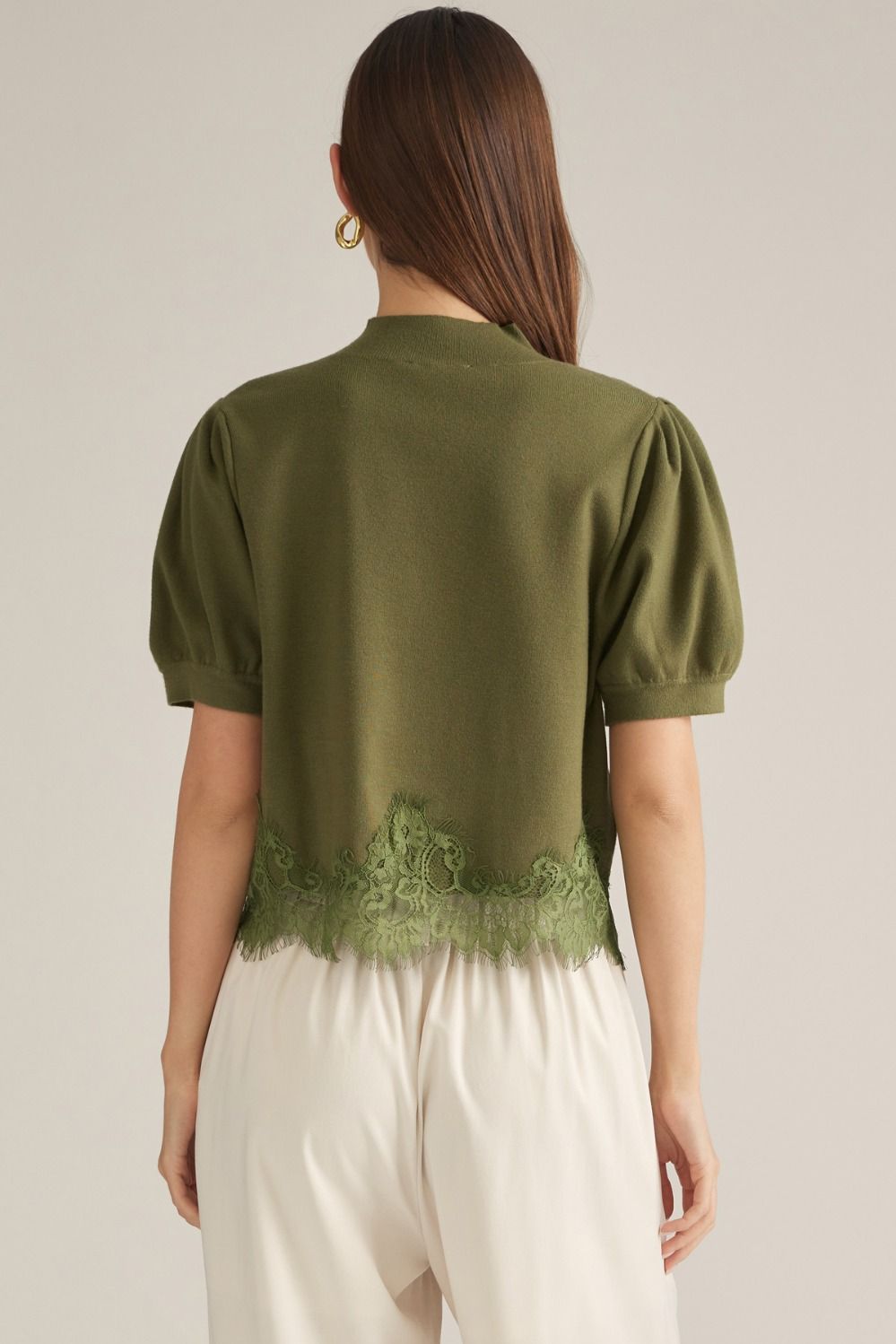 Green puff sleeve sweater with lace bottom detail