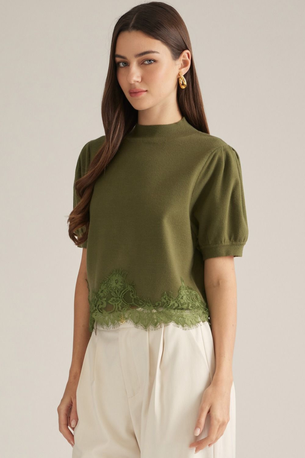 Green puff sleeve sweater with lace bottom detail
